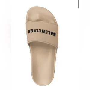 Balenciaga pool slide sandals in beige. Size 10 never worn