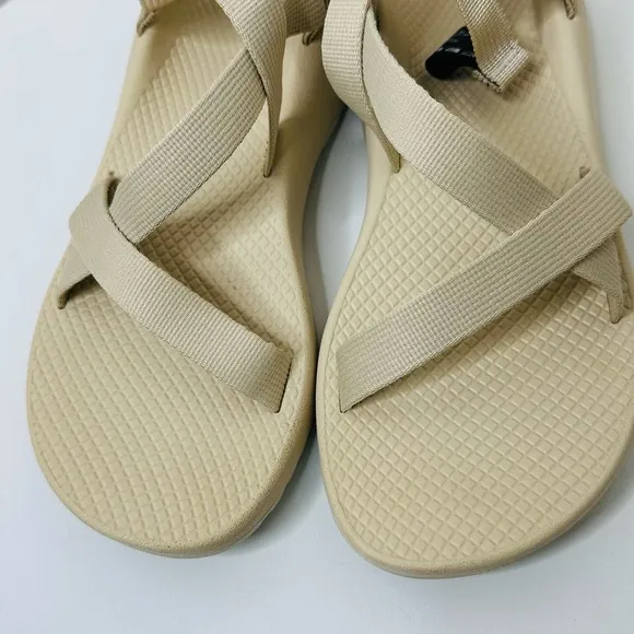 Chaco Cream Sandals with Crisscross Straps and Rugged Sole