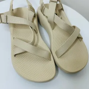 Chaco Cream Sandals with Crisscross Straps and Rugged Sole
