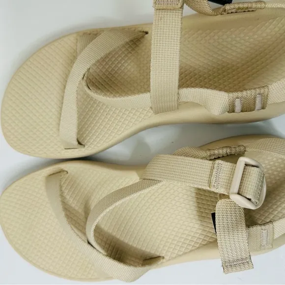 Chaco Cream Sandals with Crisscross Straps and Rugged Sole