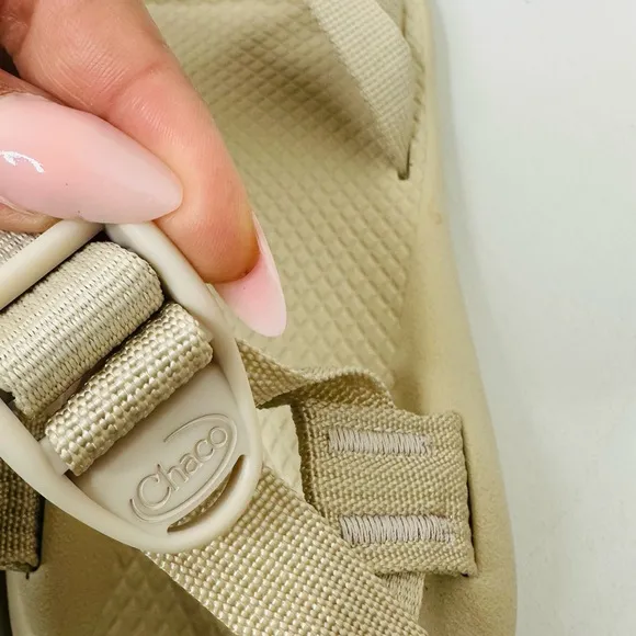 Chaco Cream Sandals with Crisscross Straps and Rugged Sole