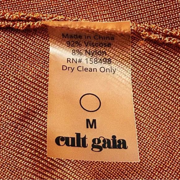 Cult Gaia Leslie Knit Halter Neck Open Back Mini Dress in Spice Orange