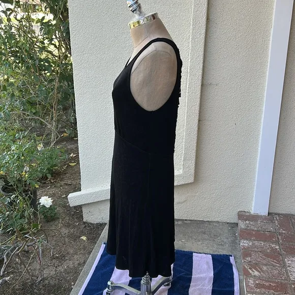 Free People Black Lady Jane Slinky stretch dress with open back lace trim.