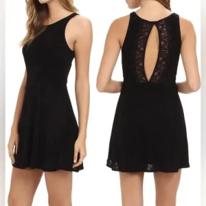 Free People Black Lady Jane Slinky stretch dress with open back lace trim.