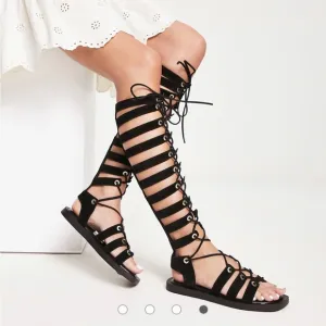 Free People sun chaser tall gladiator sandals in black. New in box. Size 8
