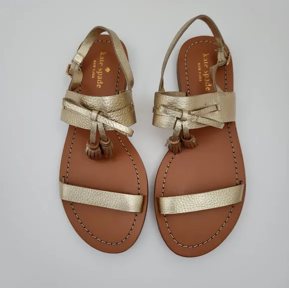 Kate Spade Carlita gold leather slingback sandals tassel 7.5 M