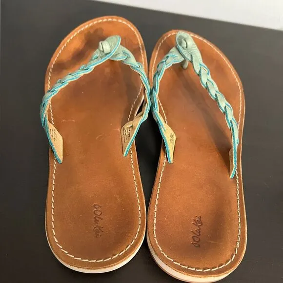 OluKai Kahiko Teal Braided Flip Flops Sandals, women’s size 7. Brown tan leather