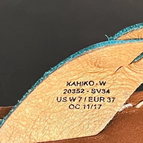 OluKai Kahiko Teal Braided Flip Flops Sandals, women’s size 7. Brown tan leather