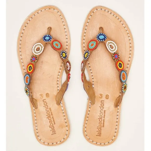 Revolve NWT laidback London Fun Tribal Flip Flop hand beaded sandals Pool Party