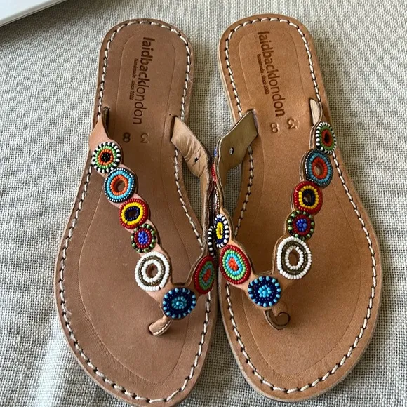 Revolve NWT laidback London Fun Tribal Flip Flop hand beaded sandals Pool Party