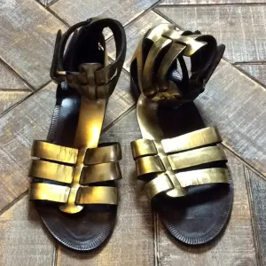 Theory gold gladiator sandals. EUC